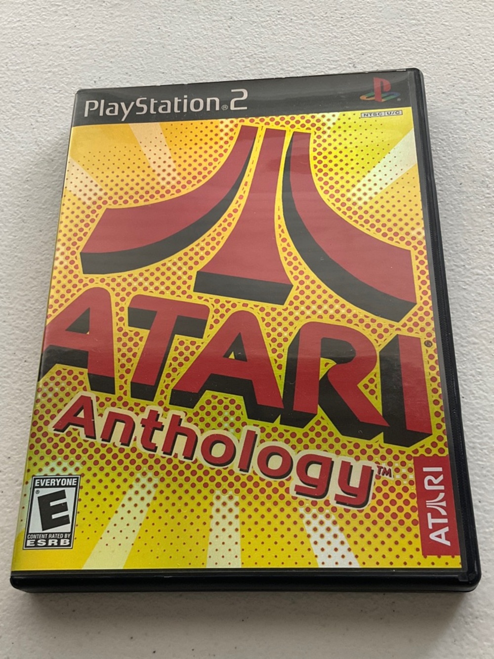 Atari Anthology for PlayStation 2 - Atari Brand Yellow & Red Cover